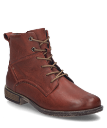 L'image montre une bottine rouge en cuir avec lacets. La chaussure a une semelle robuste et de fins détails de couture qui lui donnent un look classique.