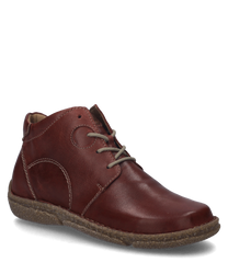 La bota burdeos está hecha de cuero y cuenta con una práctica cremallera en el costado. El zapato tiene una suela robusta y costuras decorativas que le dan un toque elegante al diseño.
