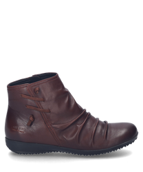 The burgundy leather ankle boot features a side zipper and decorative lacing details. The smooth surface and slightly gathered structure give the shoe an elegant and modern look.