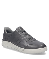 La sneaker è di un elegante tono grafite ed è realizzata in materiale liscio e di alta qualità. Caratteristiche speciali sono la pratica chiusura con elastico in gomma e la discreta stampa del logo sul lato.