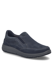 Indigo-colored slip-on shoe with elastic made of soft material. The shoe has a sturdy sole and subtle decorative stitching.
