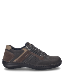 La scarpa in colore fango-combinato è realizzata in pelle di alta qualità e presenta un'istruzione di allacciatura marcata. Caratteristiche speciali sono la chiusura lampo laterale e i dettagli perforati che offrono ulteriore stile e traspirabilità.