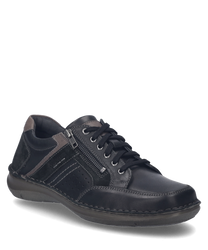 La scarpa in combinazione nera si presenta con una chiusura a lacci ed è realizzata in pelle di alta qualità. I punti decorativi laterali e la cerniera offrono ulteriore stile e funzionalità.