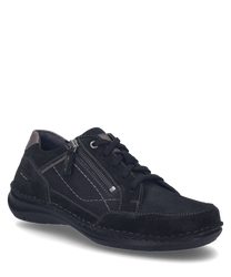 El zapato semi-abierto en combinación negro se presenta con un cierre de cordones y está hecho de una mezcla de materiales que resulta robusta y elegante. Las características especiales son las costuras decorativas laterales y un detalle de cremallera que 