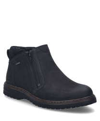 The black ankle boot is made of smooth material and features a practical zipper on the side. The shoe has a sturdy sole and is perfect for a casual stylish look.