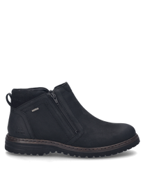 The black ankle boot is made of smooth material and features a practical zipper on the side. The shoe has a sturdy sole and is perfect for a casual stylish look.