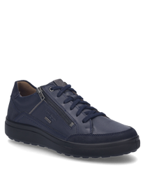 La sneaker nel colore Ocean-Kombi è realizzata in pelle di alta qualità e presenta una chiusura con lacci e una cerniera laterale. La colorazione blu scuro e il design semplice la rendono facilmente abbinabile.