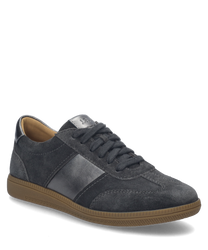 The sneaker in granite combination features a classic lacing system and is made from high-quality dark gray material. Special features include contrasting side stripes and a sturdy light brown sole.