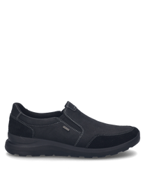 Black slip-on shoes made of smooth material with elastic closure for easy wear. The shoe features subtle decorative stitching and a comfortable textured sole.