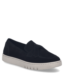 A black slip-on shoe with elastic made from a soft material that ensures comfort. The shoe features a white sole with fine grooves for better grip.