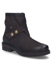 La bota en color Moro está hecha de cuero de alta calidad y cuenta con un cierre lateral de cremallera. Las características especiales son los botones decorativos en color dorado y el robusto tacón oscuro.