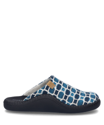 The house slipper in turquoise-multi features a patterned design with a comfortable open entry without closure. The material appears soft and warm and the sole is in a solid black.