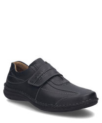 Scarpa bassa in pelle nera con chiusura in velcro. Design elegante e confortevole ideale per l'uso quotidiano.