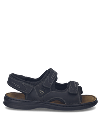 Schwarze Sandale aus Leder mit praktischem Klettverschluss. Die Sohle ist robust und bietet guten Halt ideal für den Sommer.