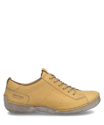 The shoe is a low-cut style with a lacing closure made from smooth yellow leather. It features a minimalist design and a light sole providing a casual yet stylish look ideal for everyday wear.