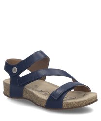 Sandalias de color azul marino con cierre de velcro. Suela de corcho con plantilla ergonómica para mayor comodidad.