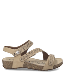 Beige sandals with Velcro straps featuring a speckled design and a cushioned cork sole. The open-toe design adds comfort and the sandals are ideal for casual wear.