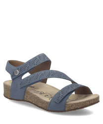 Sandalo in pelle blu con chiusura in velcro. La suola è in sughero per un comfort ottimale.
