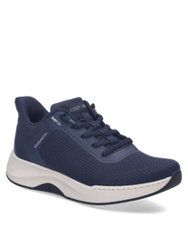 Zapato deportivo azul marino de material sintético con diseño de fácil ajuste. La suela blanca ofrece comodidad y soporte para un uso diario prolongado.
