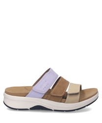 Sandalias cómodas con cierre de velcro. Colores pastel en tonos lila beige y marrón sobre una suela blanca.