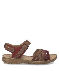 Brown leather sandals with Velcro closure featuring decorative stitching and cut-out patterns. The sole is textured for grip providing comfort and style for everyday wear.