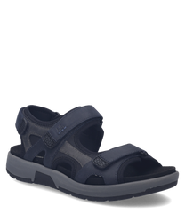 Donkerblauwe sandaal met klittenbandsluiting. Het materiaal is leer met een stevige zool voor comfort.