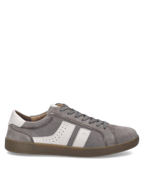 A stylish gray suede sneaker with white leather accents and perforated details. It features a lace-up closure and a brown rubber sole for a modern casual look.
