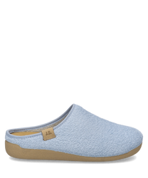 Light blue slippers made of textured fabric with a tan rubber sole. Features an open back and a small logo tag on the side.