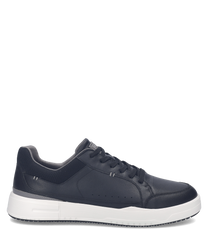 Zapato deportivo de cuero negro con cordones. Suela blanca antideslizante y diseño moderno ideal para uso diario.