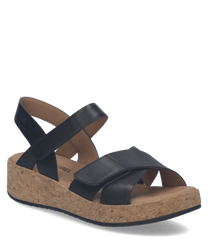 Black sandals featuring a Velcro closure with a cork sole. Made from smooth leather these sandals offer easy wear and a comfortable fit for everyday use.