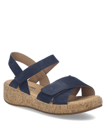 Sandales bleues en cuir avec fermeture Velcro. Semelle en liège pour un confort optimal.