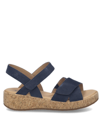 Sandales bleues en cuir avec fermeture Velcro. Semelle en liège pour un confort optimal.