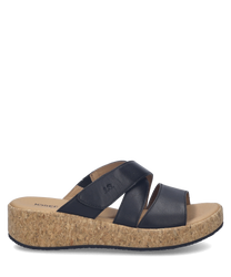 Mocassins en cuir noir avec fermeture Velcro pour un ajustement facile. Semelle en liège offrant confort et style léger parfait pour une utilisation quotidienne.