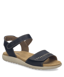 Black sandals with velcro closure and beige sole. Made of leather with visible stitching for a stylish look.