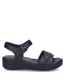 Sandales en cuir noir avec fermeture Velcro. Semelle plate-forme pour un confort optimal.