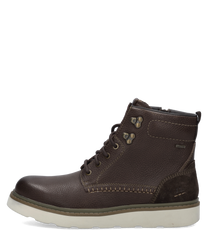 Braune Stiefelette aus Leder mit Reißverschluss. Robustes Design mit heller Sohle und dekorativen Nähten.