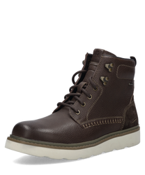 Braune Stiefelette aus Leder mit Reißverschluss. Robustes Design mit heller Sohle und dekorativen Nähten.