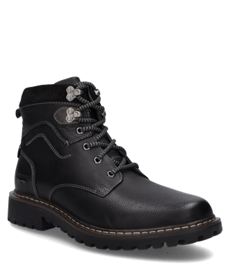 Die Stiefelette besteht aus weichem Leder in tiefem Schwarz. Sie hat einen praktischen Reißverschluss an der Seite für einfaches An- und Ausziehen.