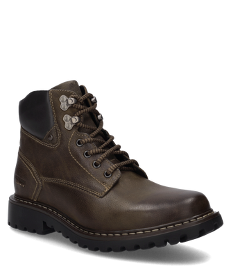 Die Stiefelette ist aus weichem Leder in tiefem Schwarz gefertigt. Sie hat einen praktischen Reißverschluss an der Seite für einfaches An- und Ausziehen.