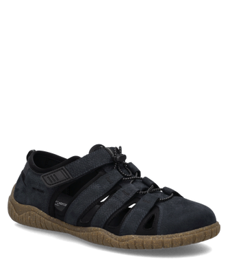 Schwarze Sandale aus textilem Material mit Klettverschluss. Die braune flexible Sohle und Cut-outs sorgen für einen sportlichen Look.