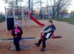 LL11322-Wippe-Metall--mit-kindjpg.jpg