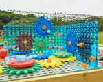 90552-outdoortisch-set-mit-spielidee-3-d-zahnraeder.png