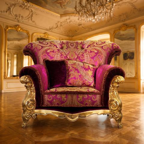 Luxury baroque armchair with damask and gold leaf in a state room