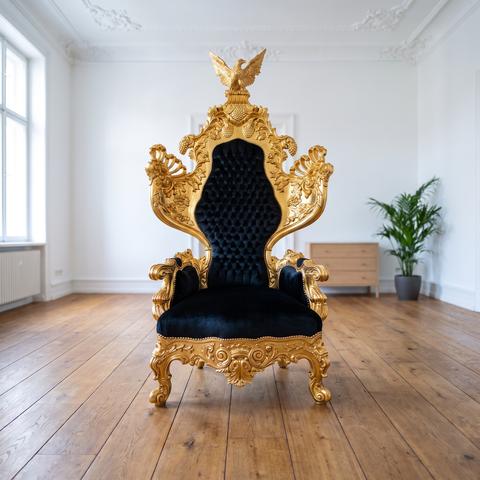 Baroque armchair in black and gold in a bright period flat