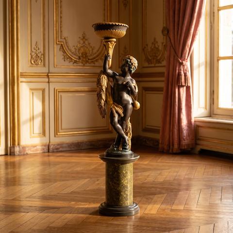 Figura barocca in bronzo su colonna di marmo