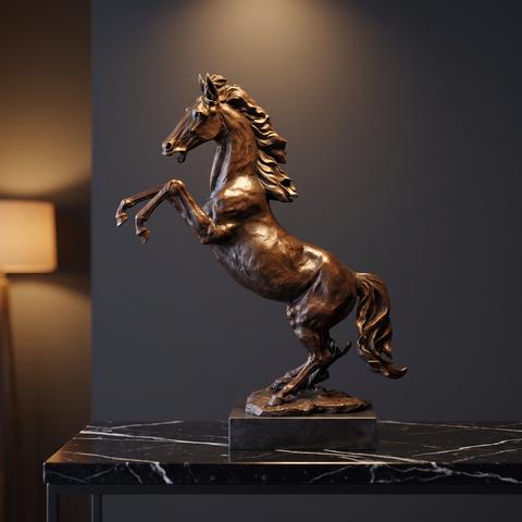 Bronze figure of a rearing horse on a marble base