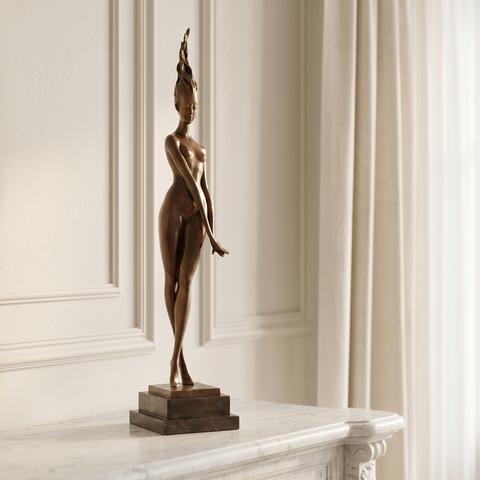 Stylised bronze figure of a woman on a tall base
