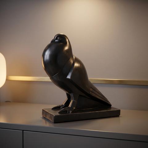 Art deco bronze figure of a bird in black on a marble base