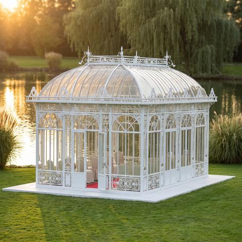 White cast iron and glass garden pavilion with domed roof