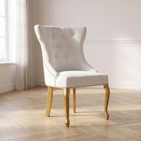 Chaise de salle à manger blanche capitonnée à pieds dorés